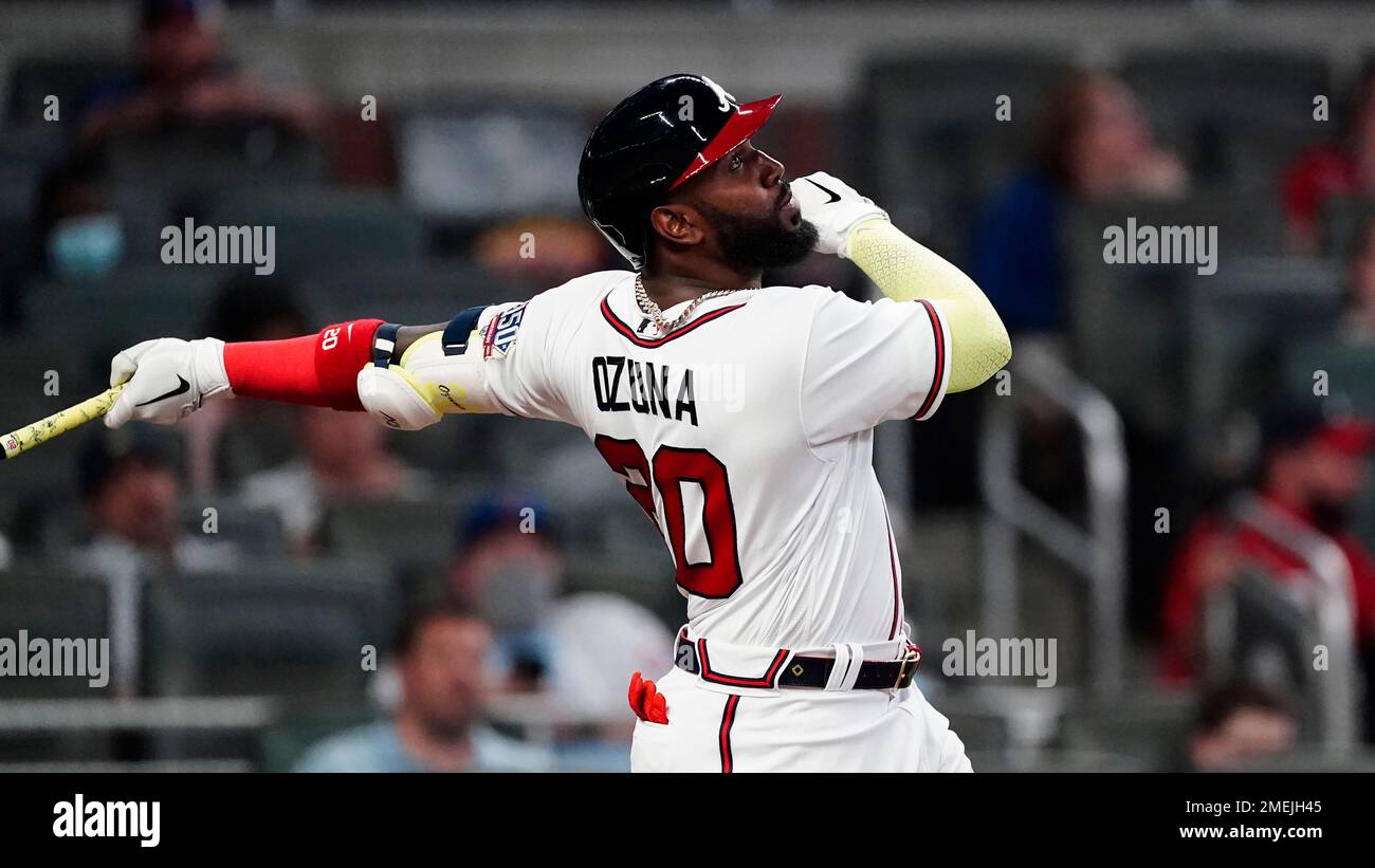 Atlanta Braves left fielder Marcell Ozuna (20) bats against the  Philadelphia Phillies during a baseball game Saturday, April 10, 2021, in  Atlanta. (AP Photo/John Bazemore Stock Photo - Alamy