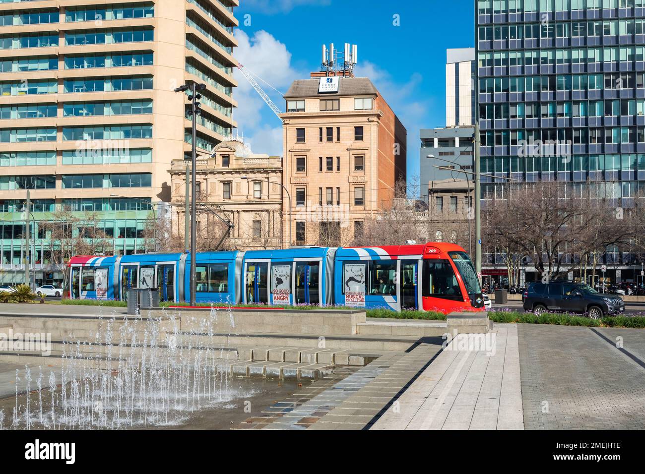 Adelaide City, South Australia - August 19, 2019: Modern Adelaide Metro tram crossing Victoria Square on a bright morning Stock Photo