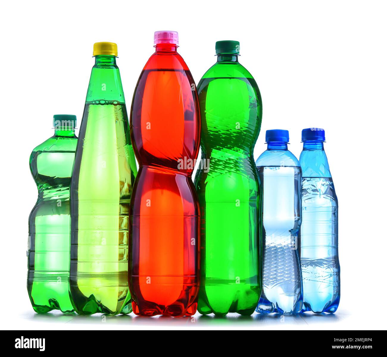 Plastic bottles of assorted carbonated soft drinks isolated on white. Stock Photo