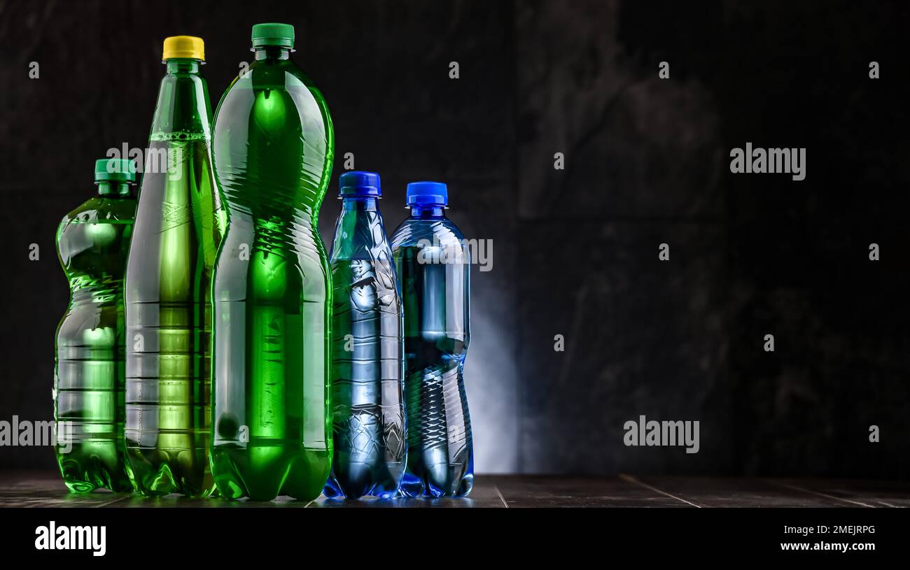 Plastic bottles of assorted carbonated soft drinks. Stock Photo