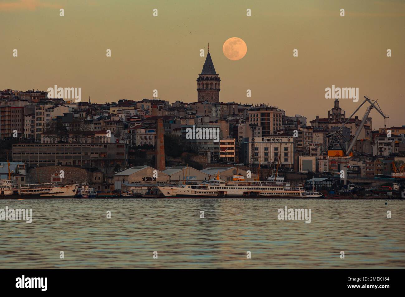 A view of the Golden Horn, with the full moon rising behind Istanbul's ...
