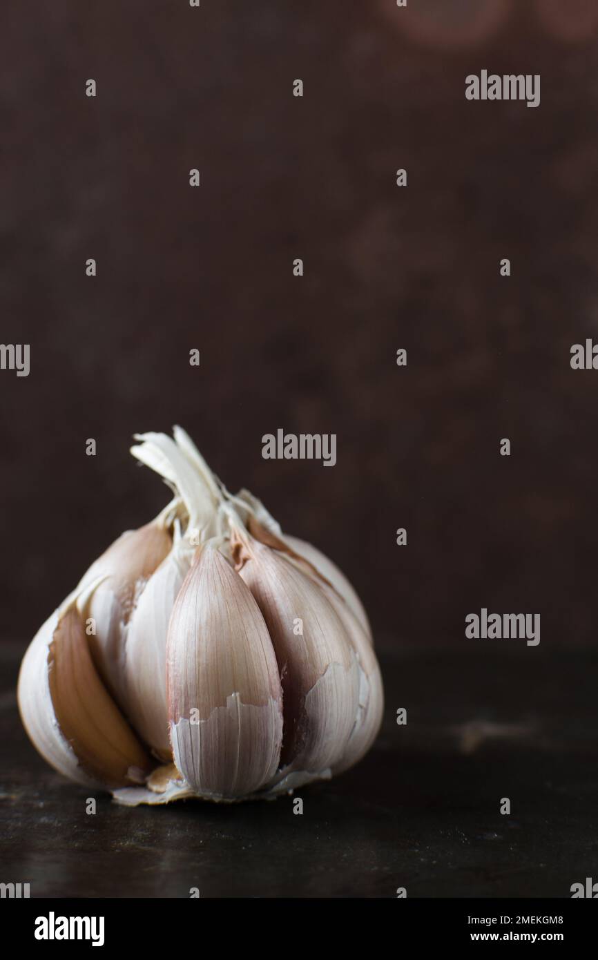 Garlic bulbs on a marble tray, garlic, raw garlic, Allium sativum Stock