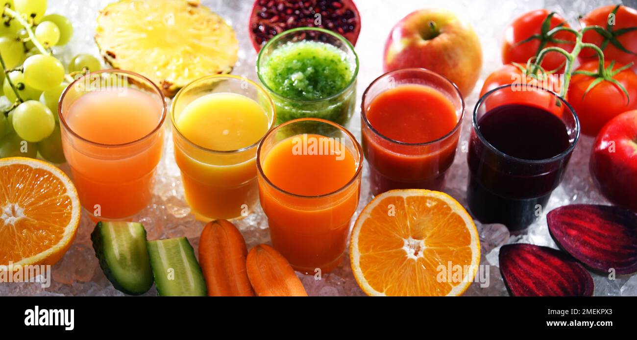 Glasses with fresh organic vegetable and fruit juices. Detox diet Stock Photo