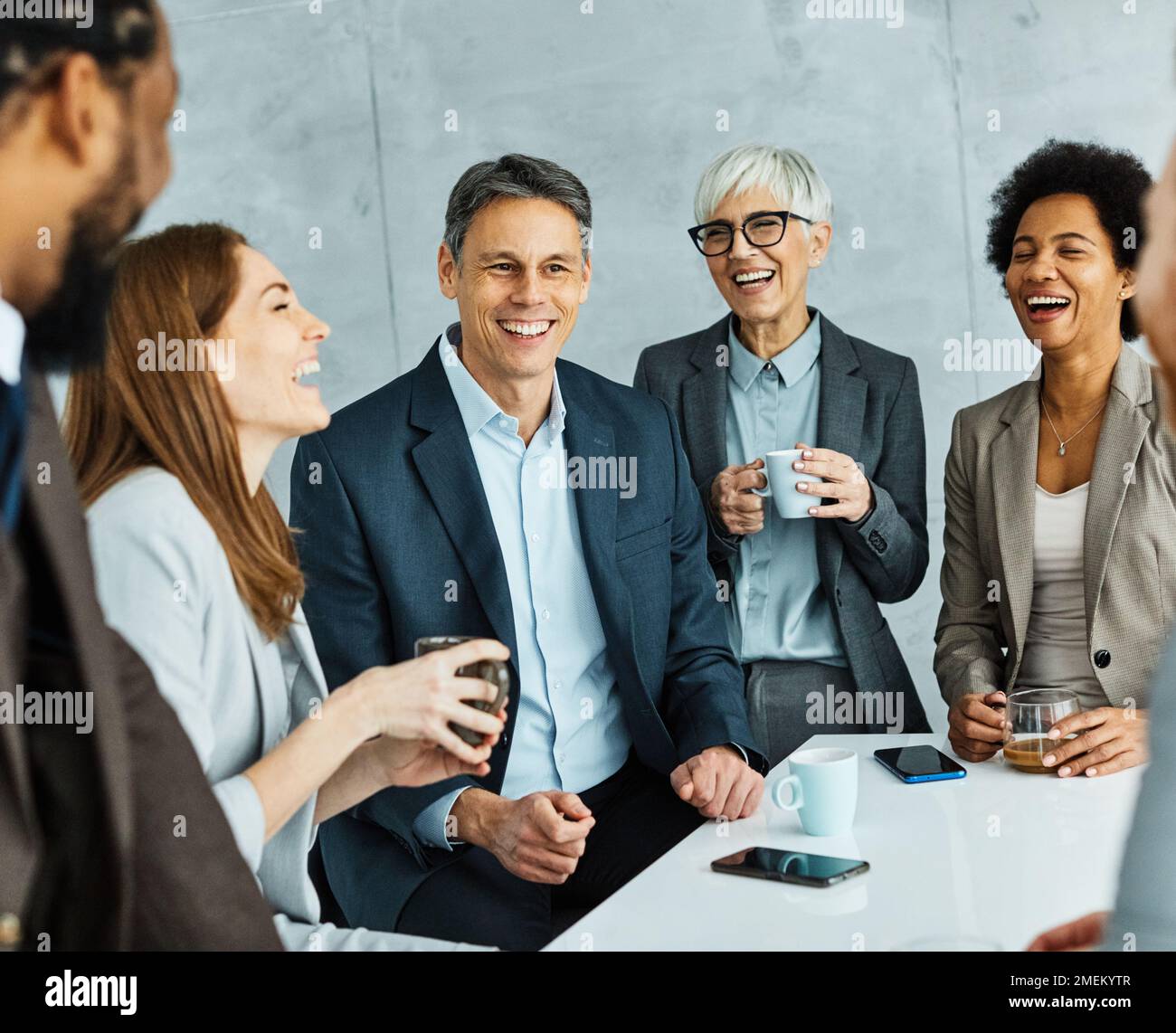 young business people meeting office teamwork group success coffee break senior mature colleague together Stock Photo