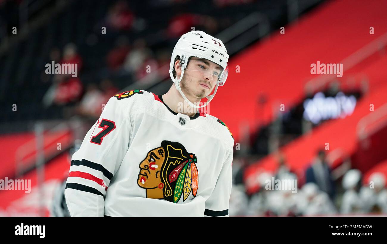 Chicago Blackhawks center Kirby Dach, right, celebrates his tying