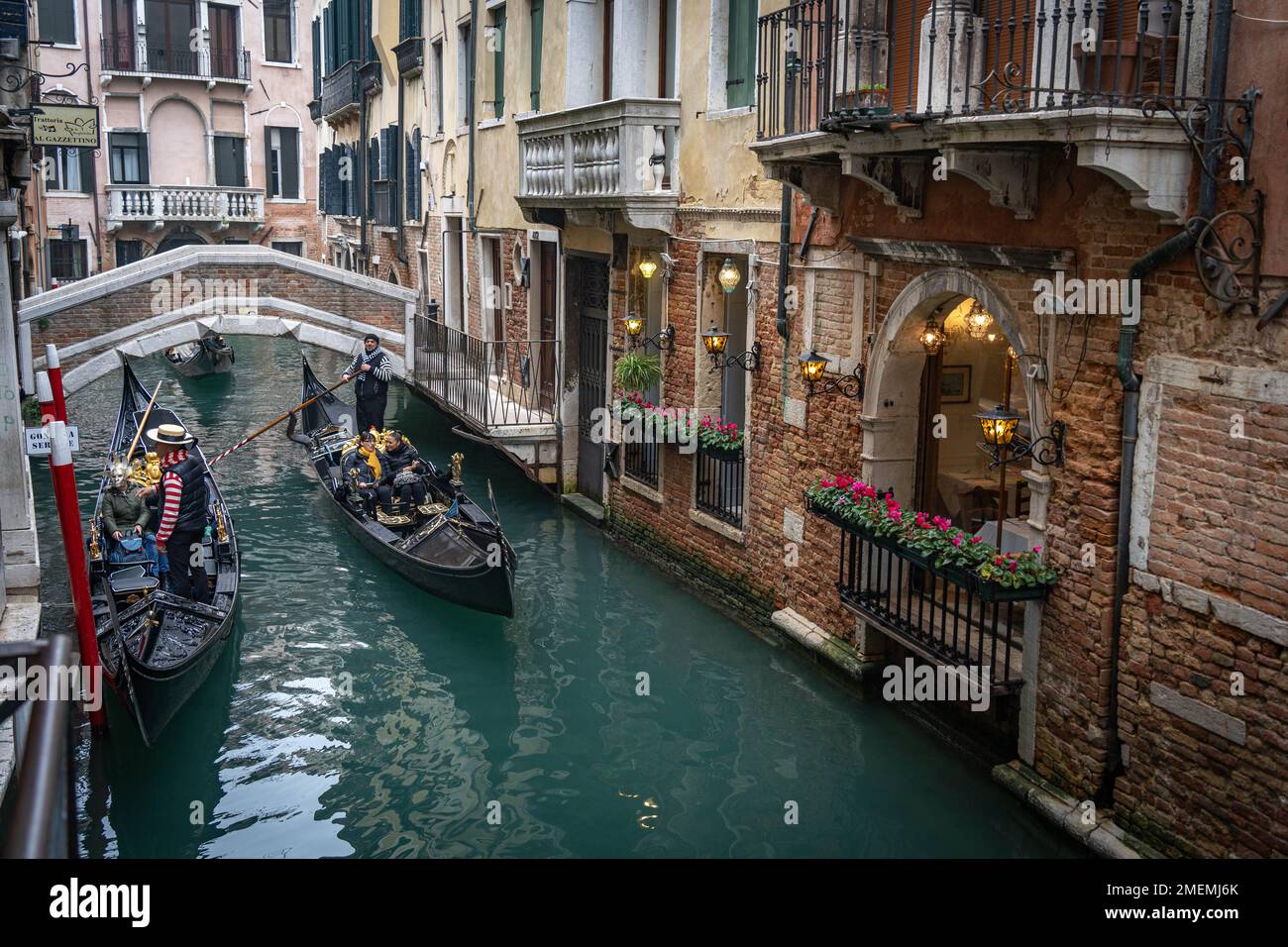 Two gondolas at the narrow canal in Venice, Italy at winter time Stock Photo