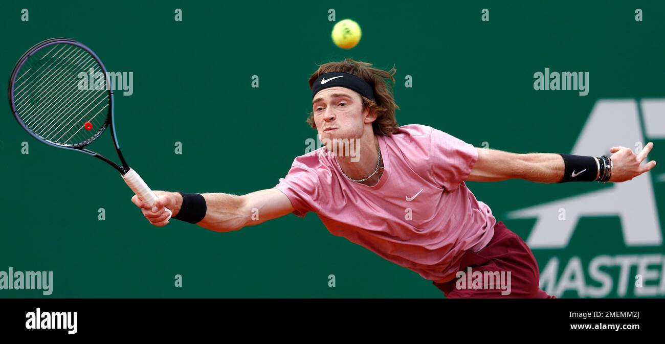 Andrey Rublev of Russia returns the ball to Casper Ruud of Norway during their semifinal match of the Monte Carlo Tennis Masters tournament in Monaco, Saturday, April 17, 2021