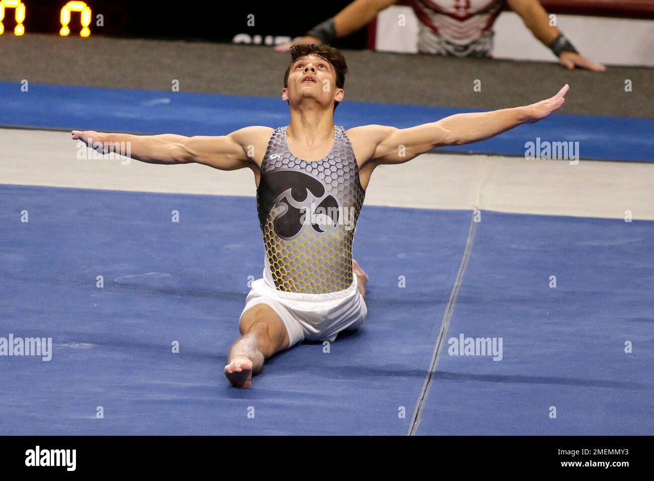 Iowa's Evan Davis competes in the floor exercise during the NCAA men's