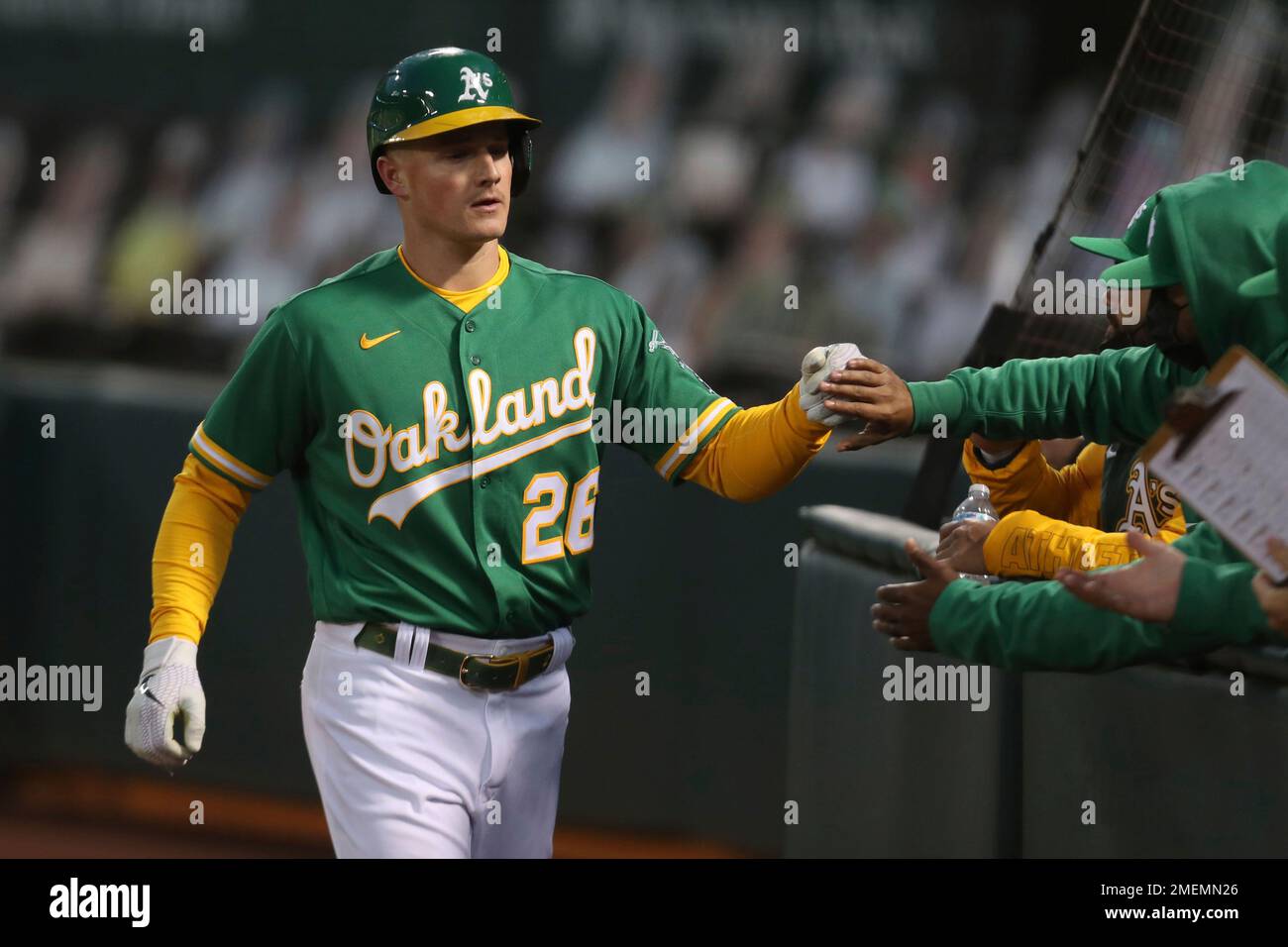 Oakland Athletics' Matt Chapman, right, is congratulated by third