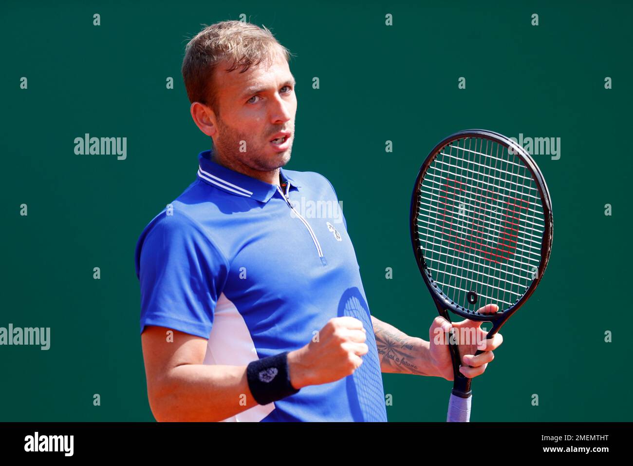 Daniel Evans of Britain reacts after scoring a point against David Goffin of Belgium during their quarterfinal match of the Monte Carlo Tennis Masters tournament in Monaco, Friday, April 16, 2021
