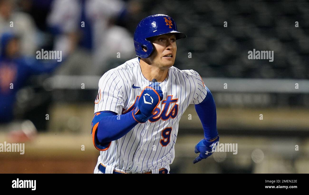 New York Mets' Brandon Nimmo (9) runs to first base for a two-run