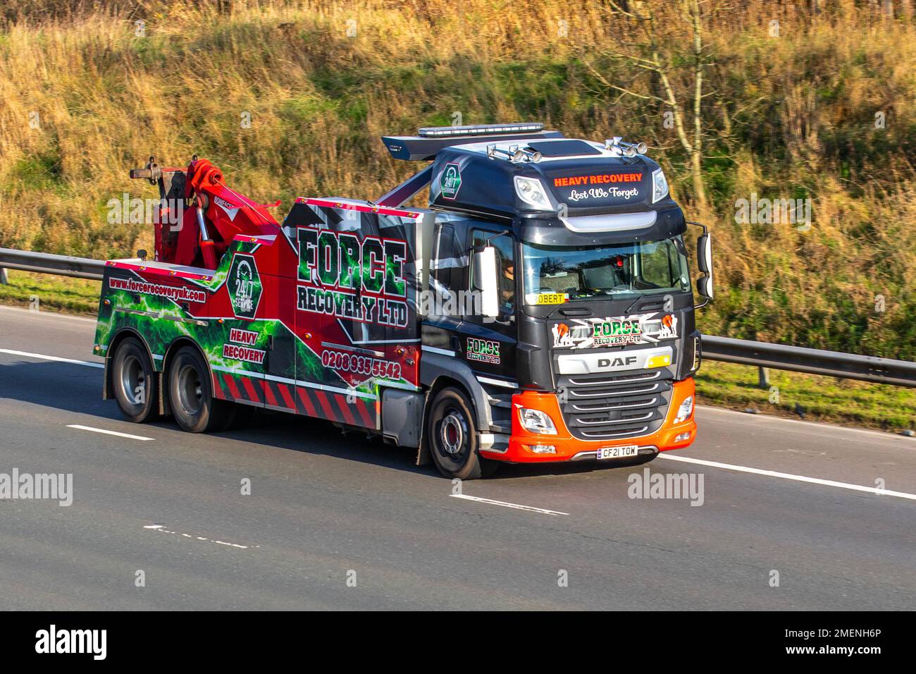 ROBERT Driving FORCE RECOVERY LTD, Heavy DAF HGV roadside 24hr vehicle recovery; travelling on the M61 motorway UK Stock Photo
