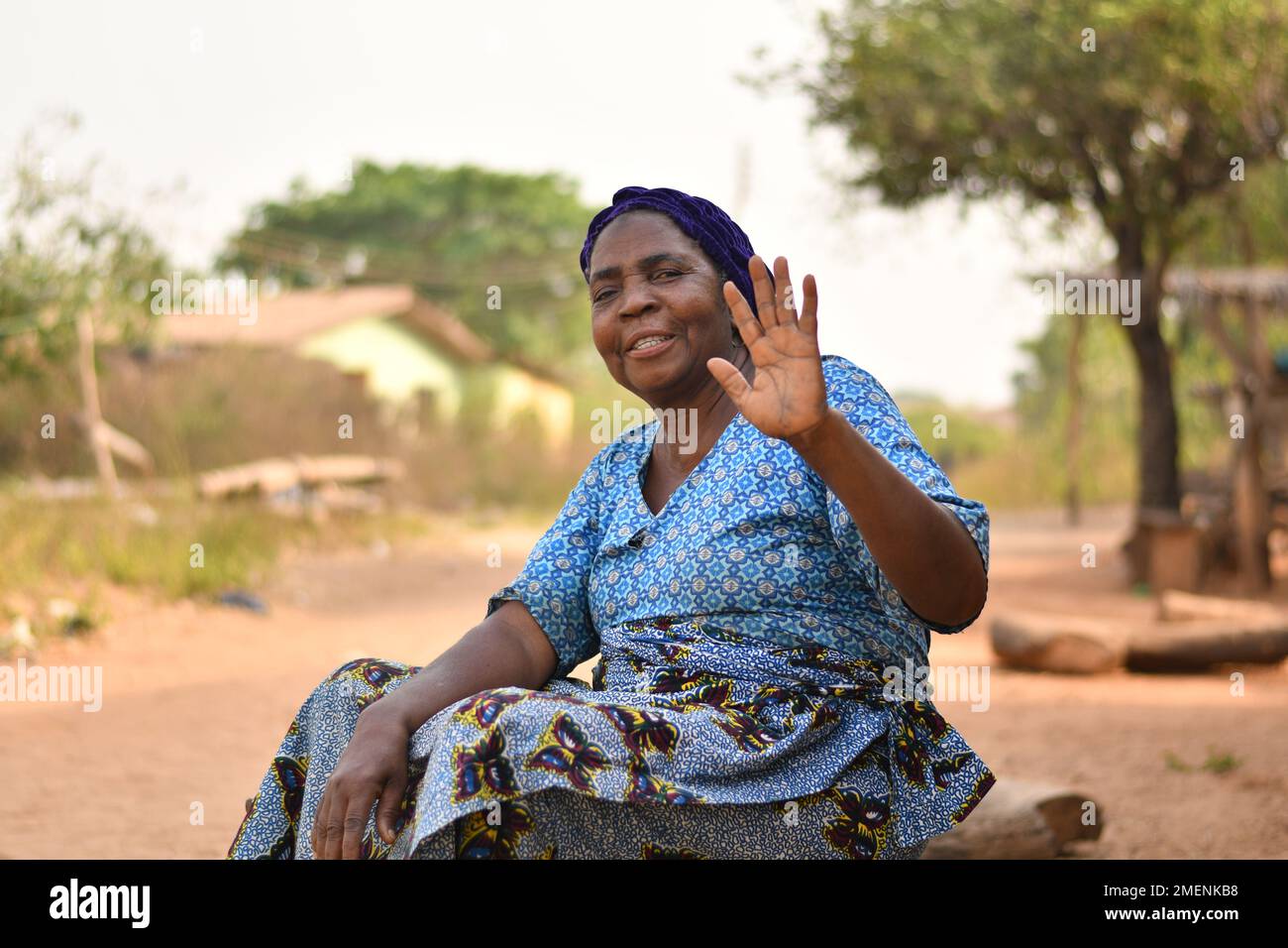 Nigerian woman waving hi-res stock photography and images - Alamy