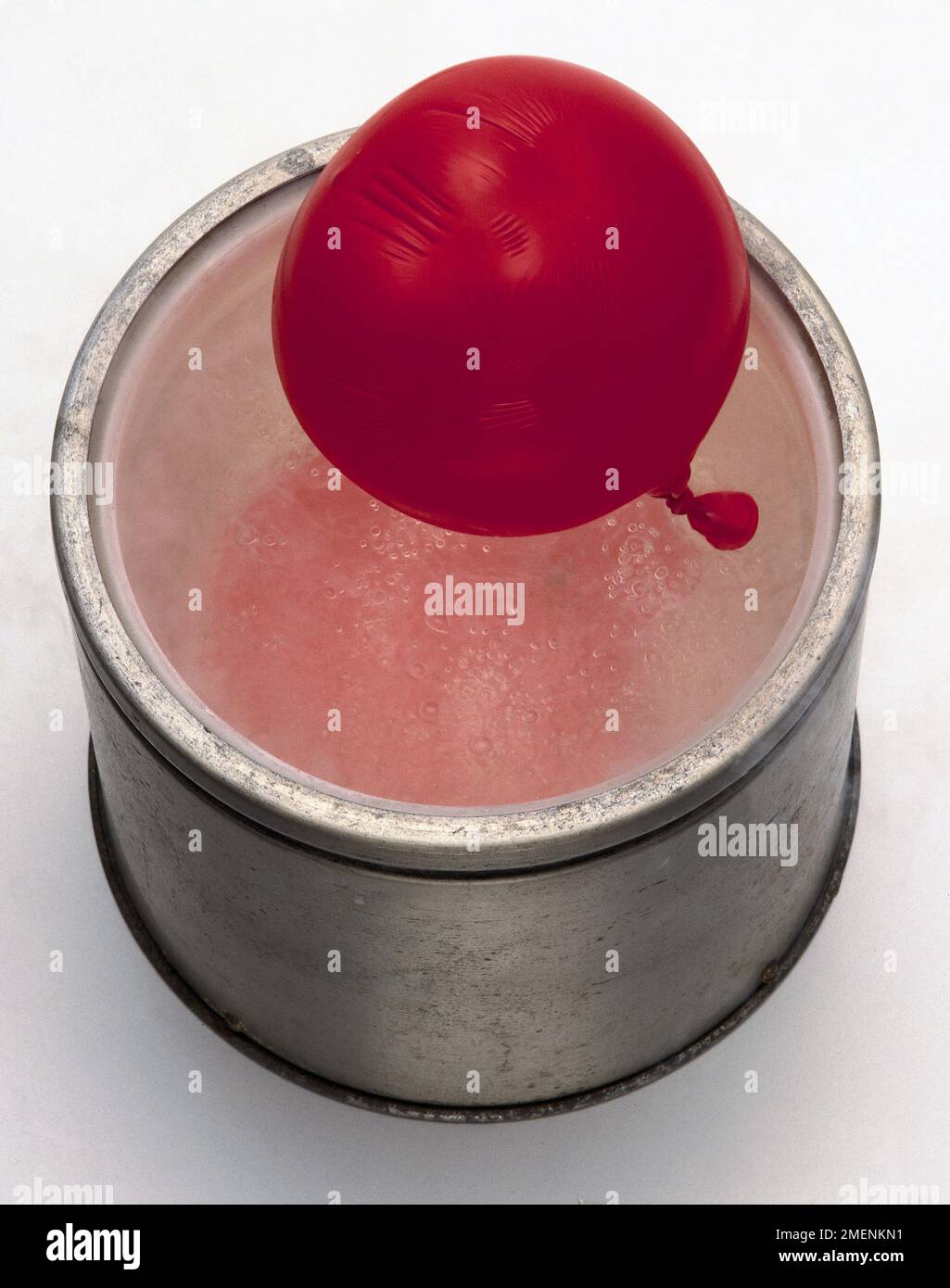 Balloon entering liquid nitrogen Stock Photo Alamy