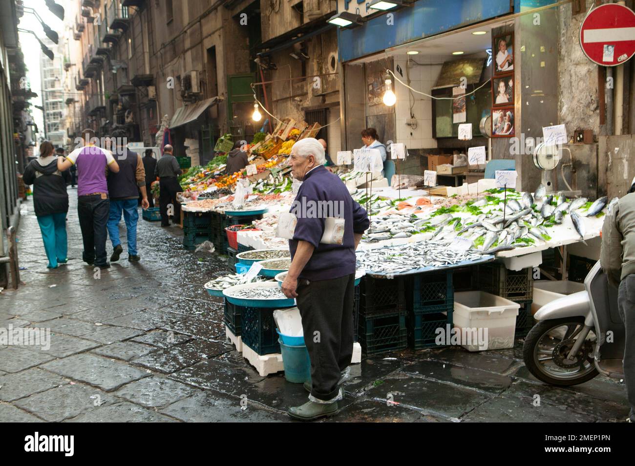 shops and people on the streets of Naples Stock Photo