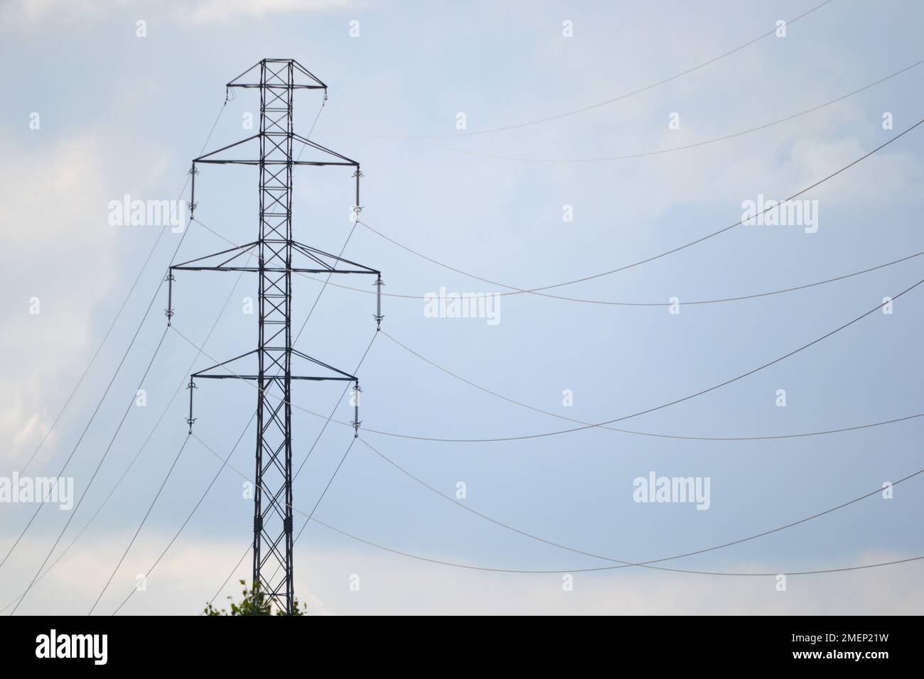 Electricity pylon and sky with clouds Stock Photo - Alamy