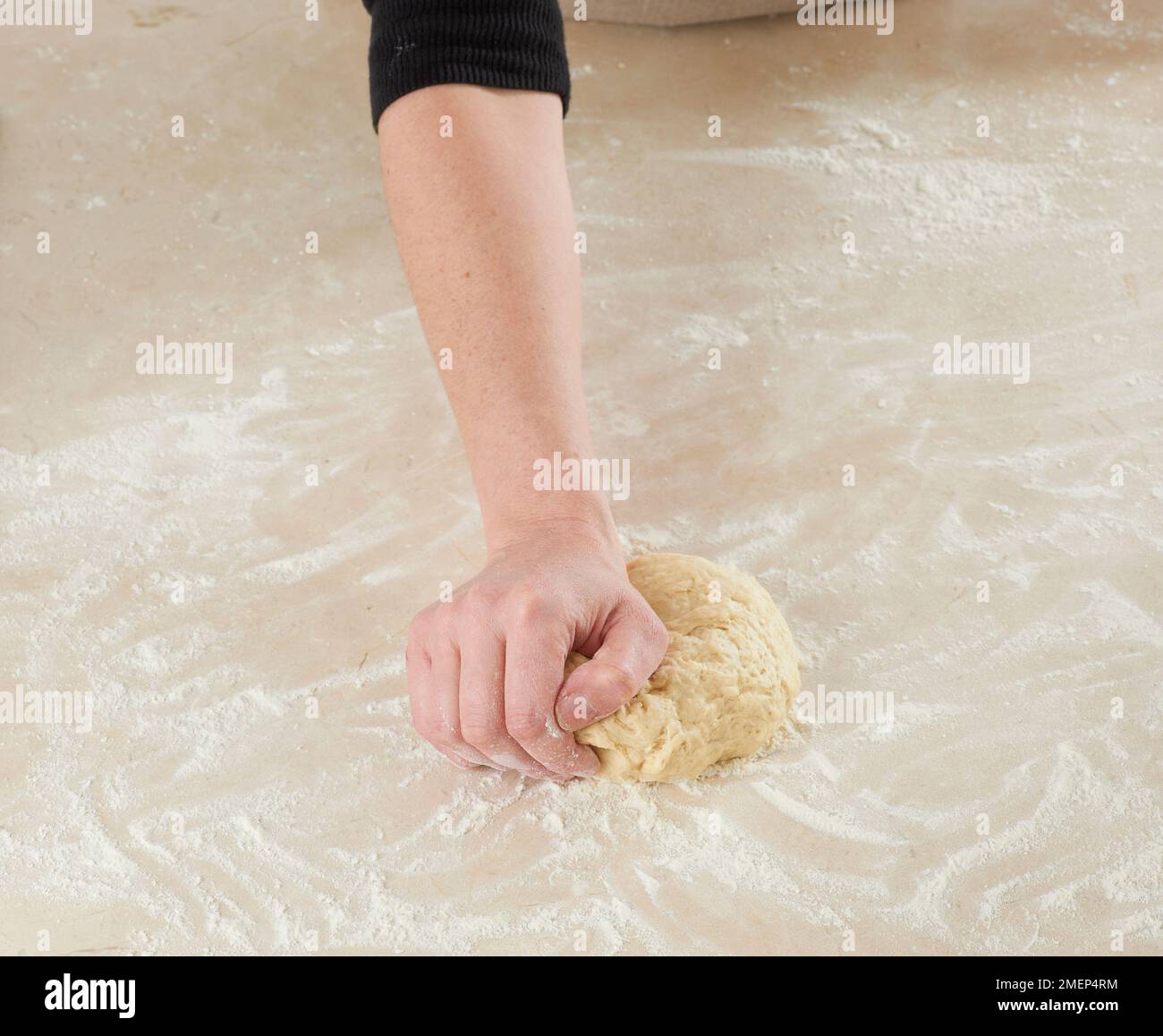 Kneading scone dough with hand Stock Photo Alamy