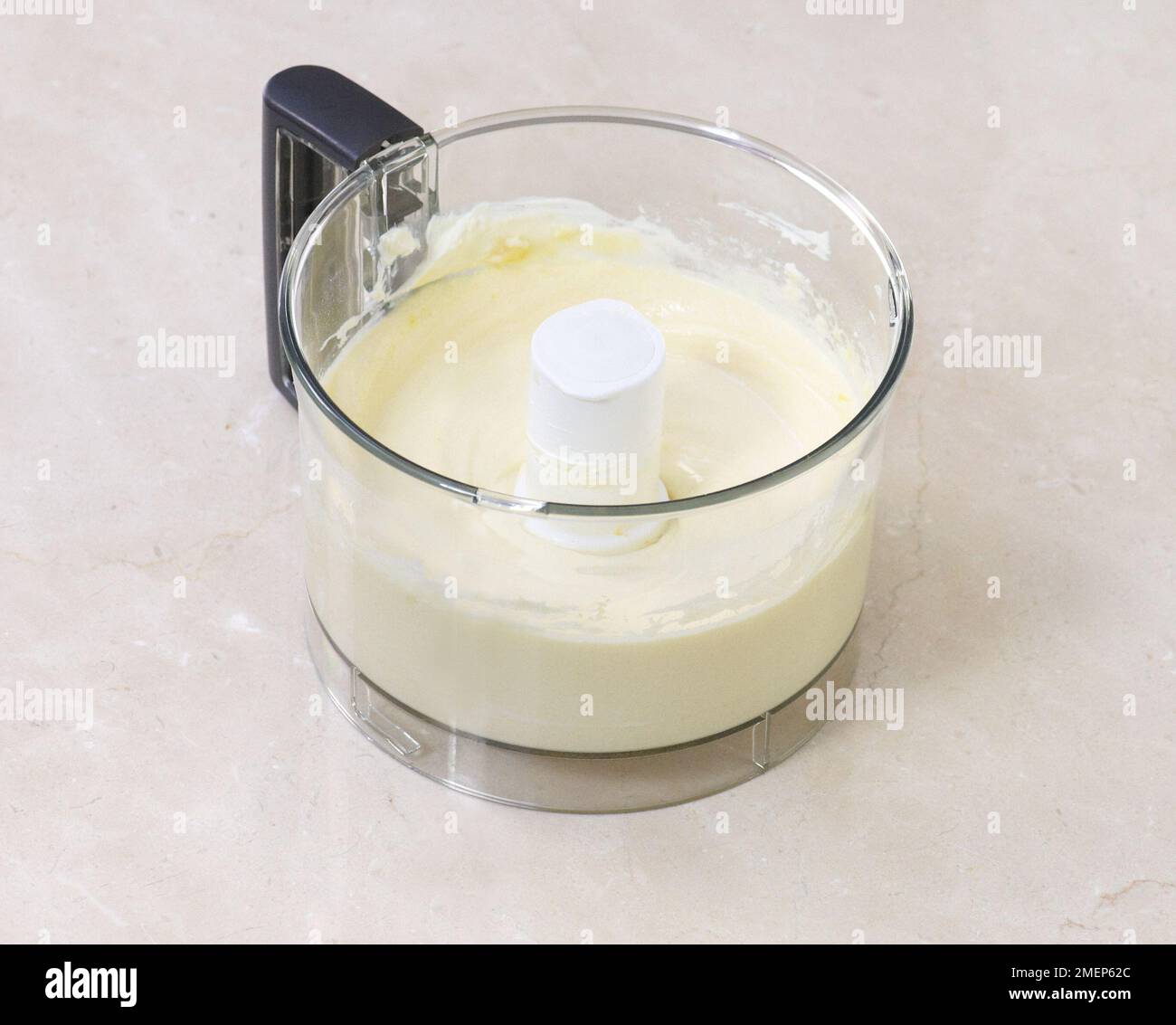 Cheesecake mixture in food processor Stock Photo