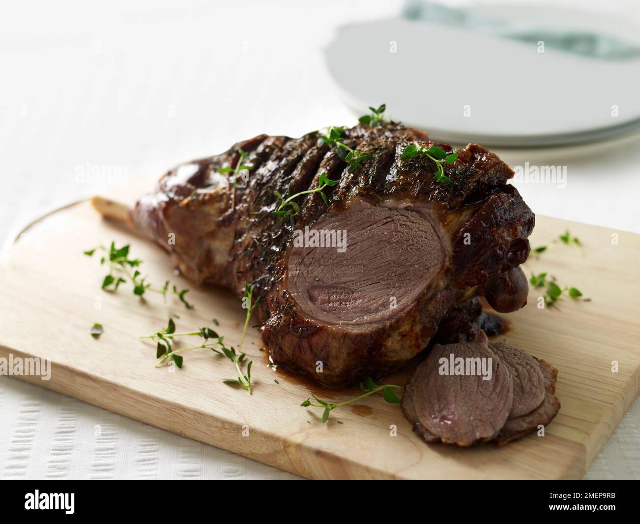 Roast leg of lamb Stock Photo - Alamy