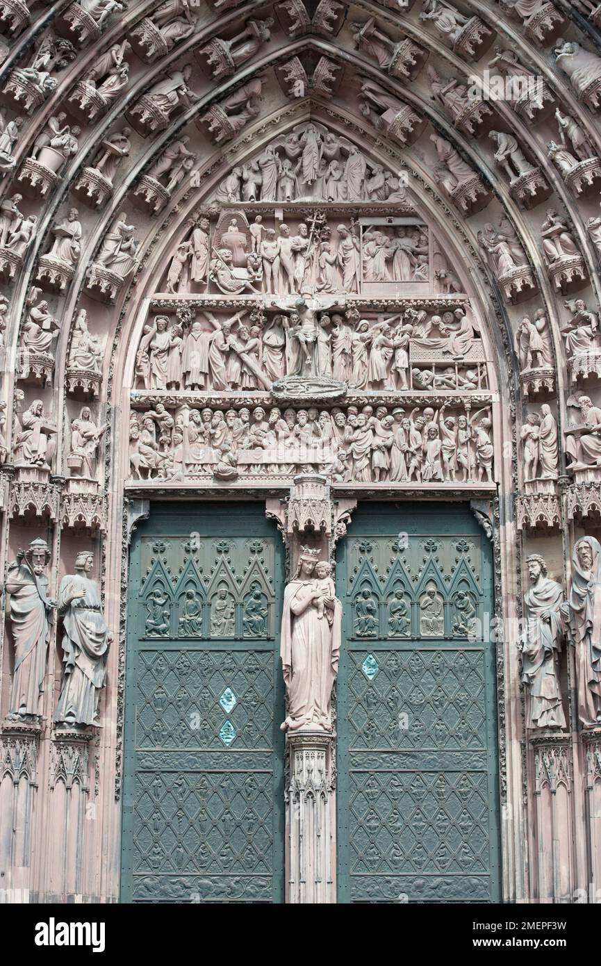 France, Alsace, Strasbourg, Cathedral of Notre Dame (Notre Dame de Strasbourg), carved gothic door Stock Photo