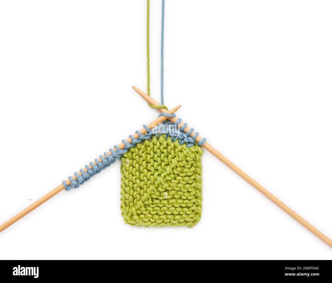 Weaving in ends during domino knitting, technique Stock Photo Alamy