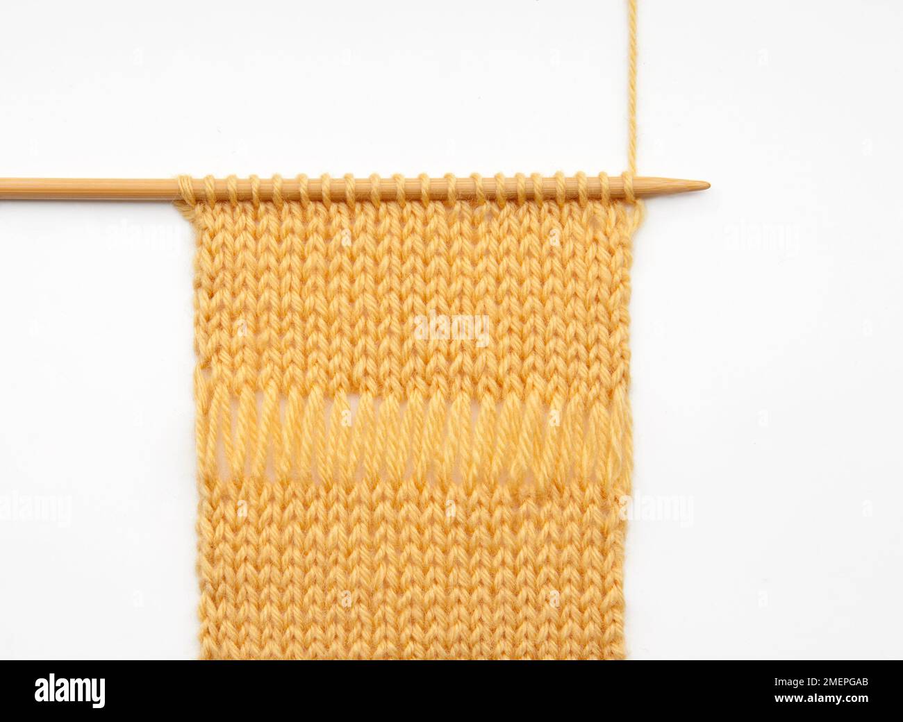 Elongated stitches knitting technique sample Stock Photo - Alamy