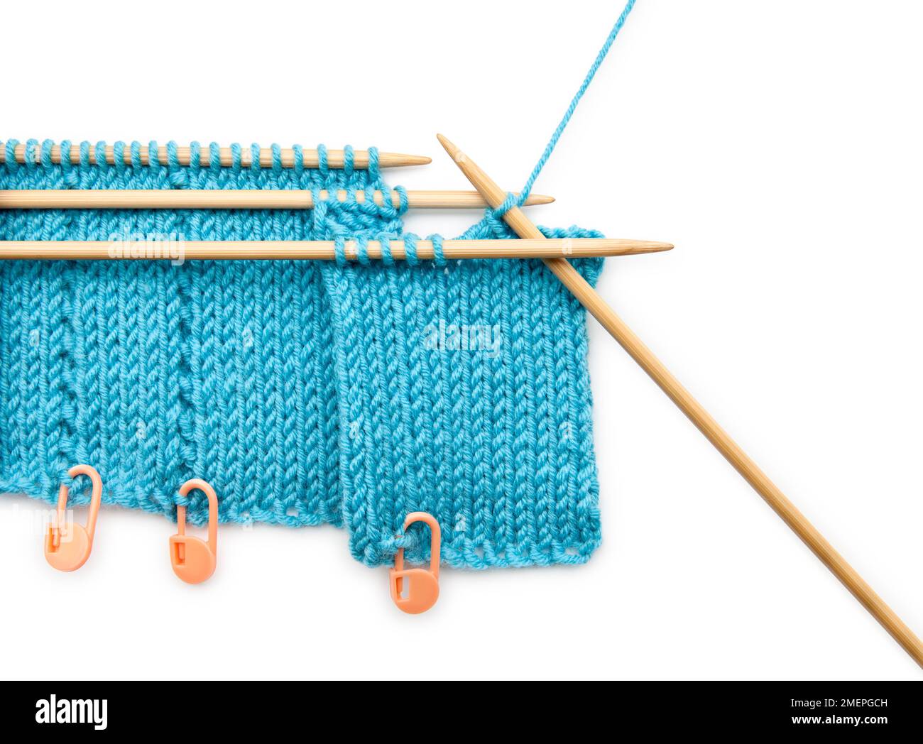 Example of knitting pleats technique using stitch holder Stock Photo