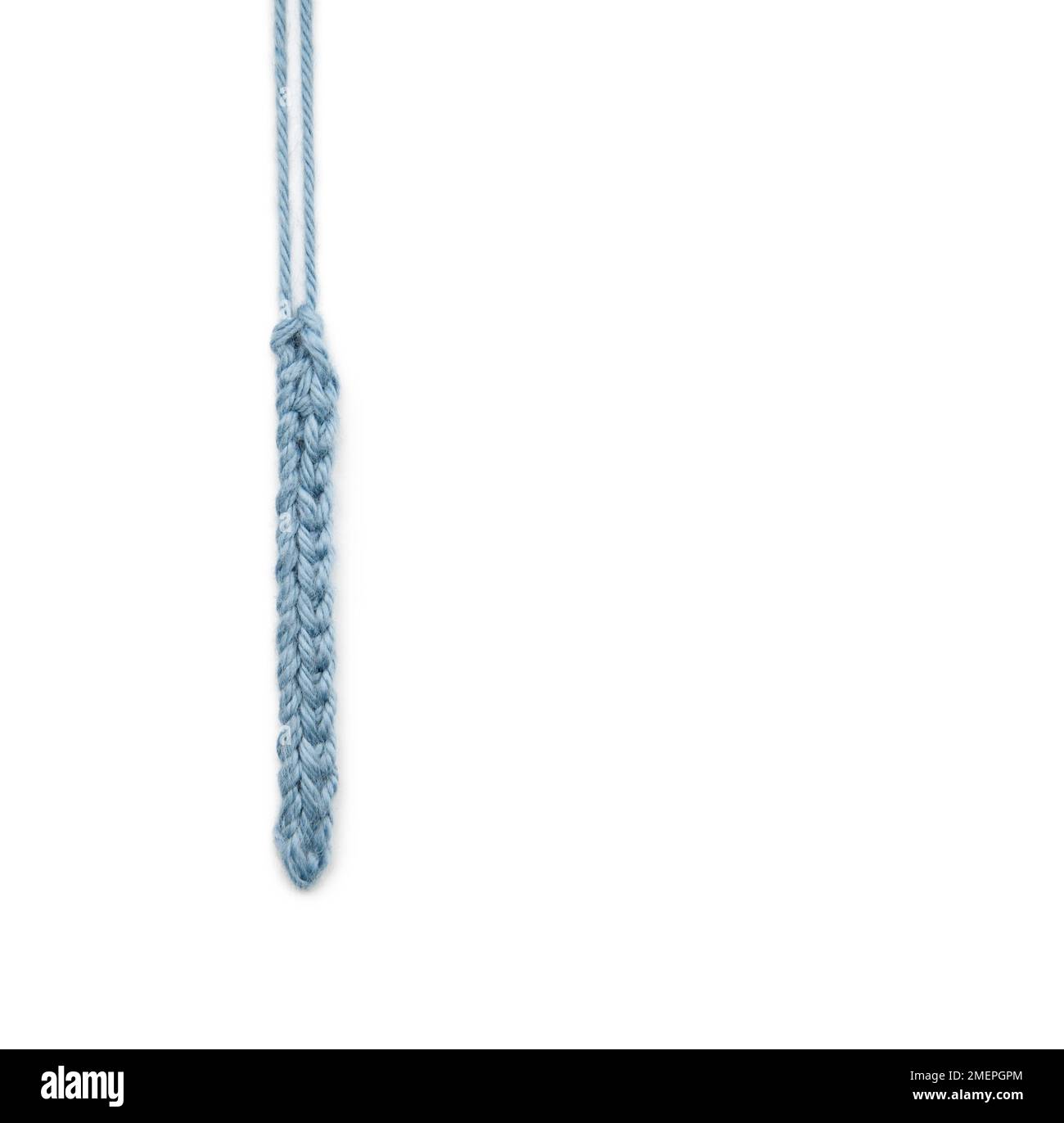 Knitted button loop Stock Photo - Alamy