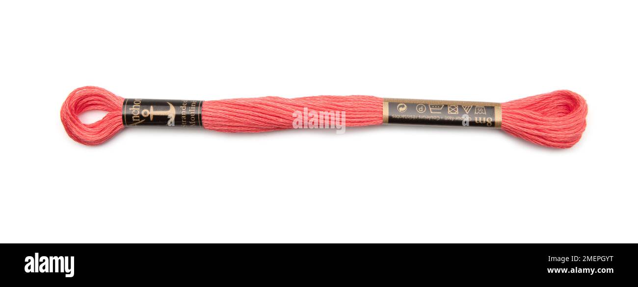 Pink embroidery thread Stock Photo - Alamy