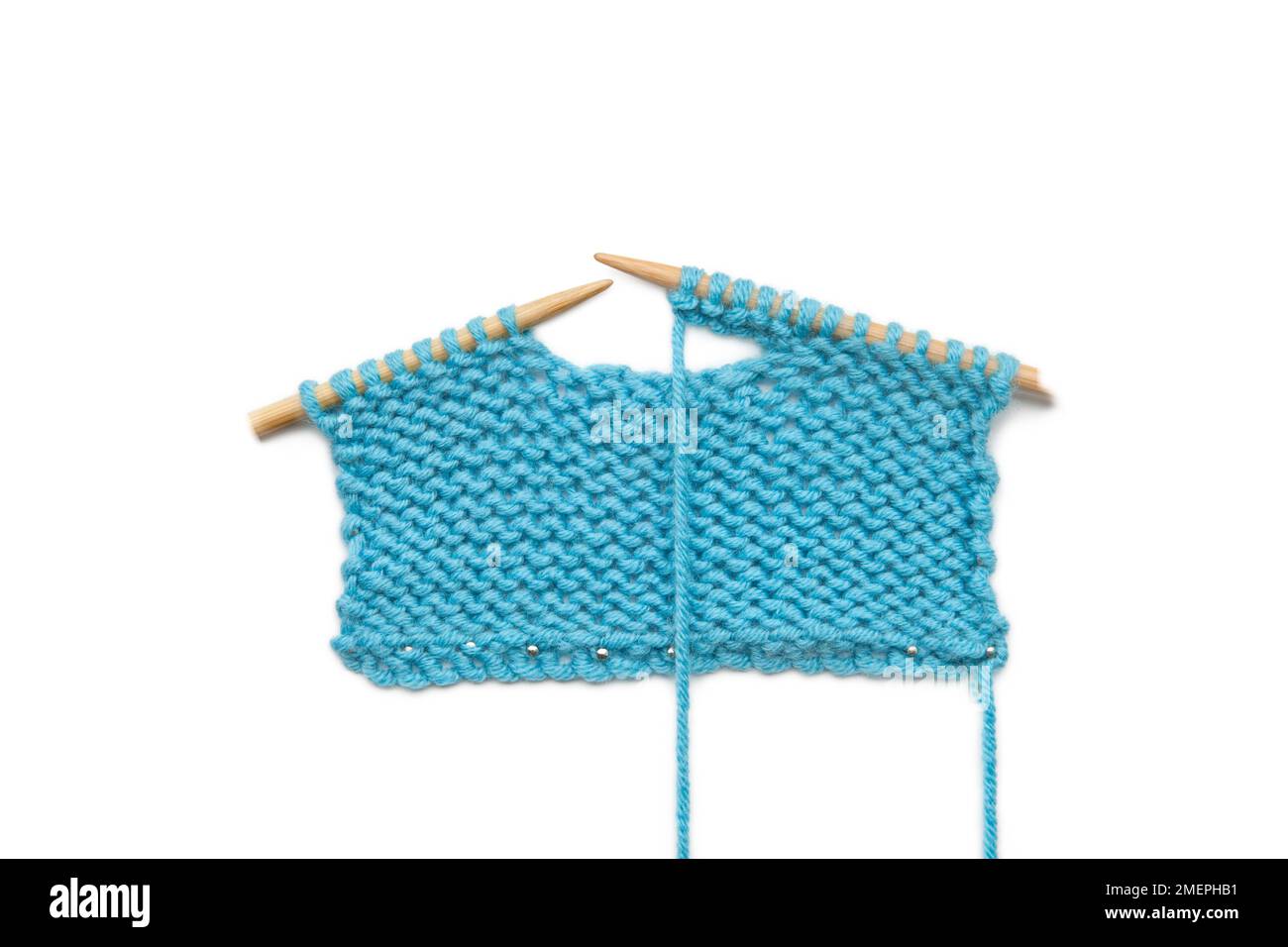 Example of castoff horizontal buttonhole knitting technique Stock