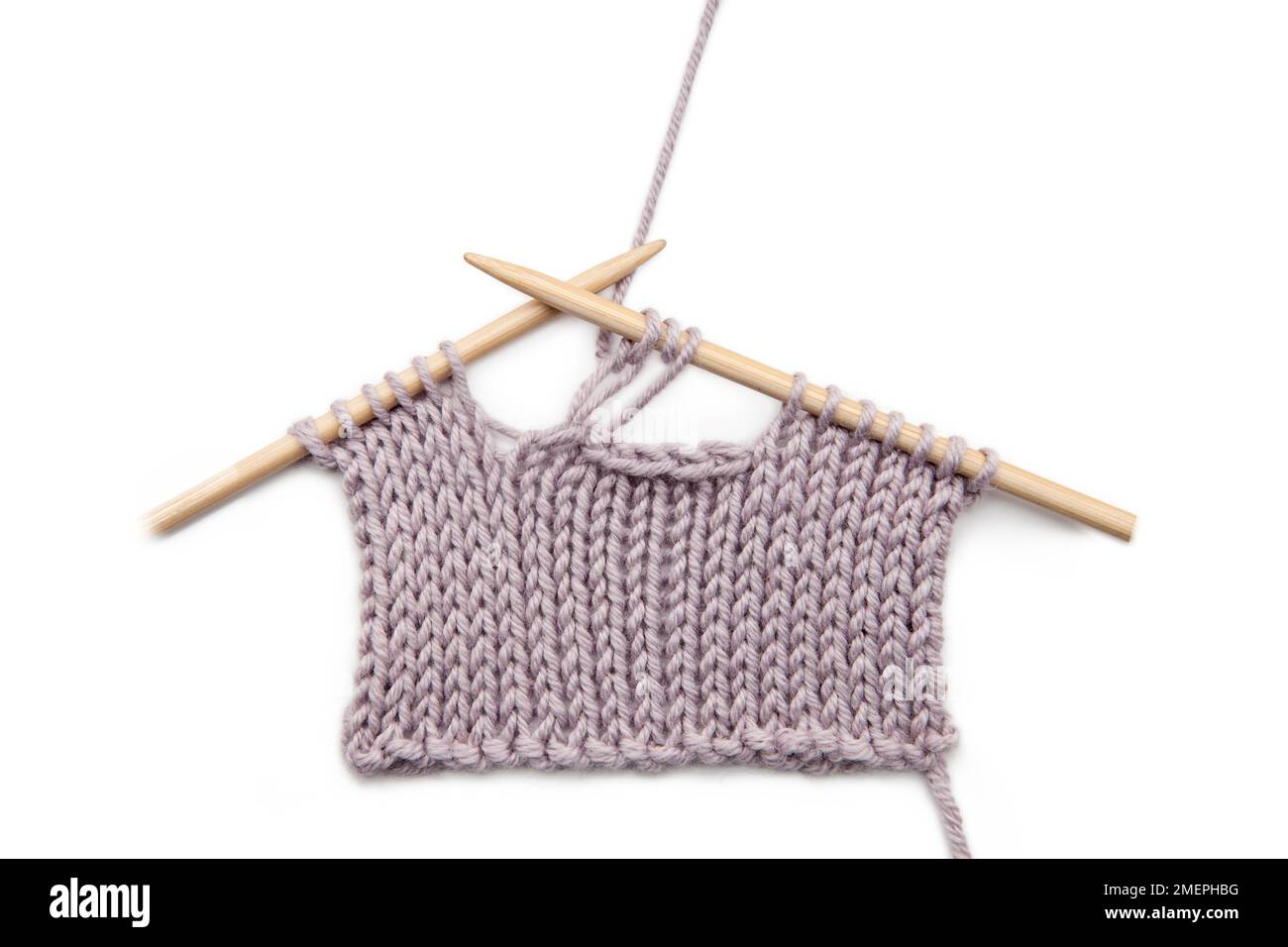 Example of increased horizontal buttonhole knitting technique Stock