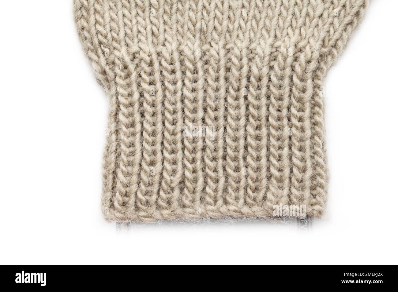 Knitted men's mitten, close-up Stock Photo