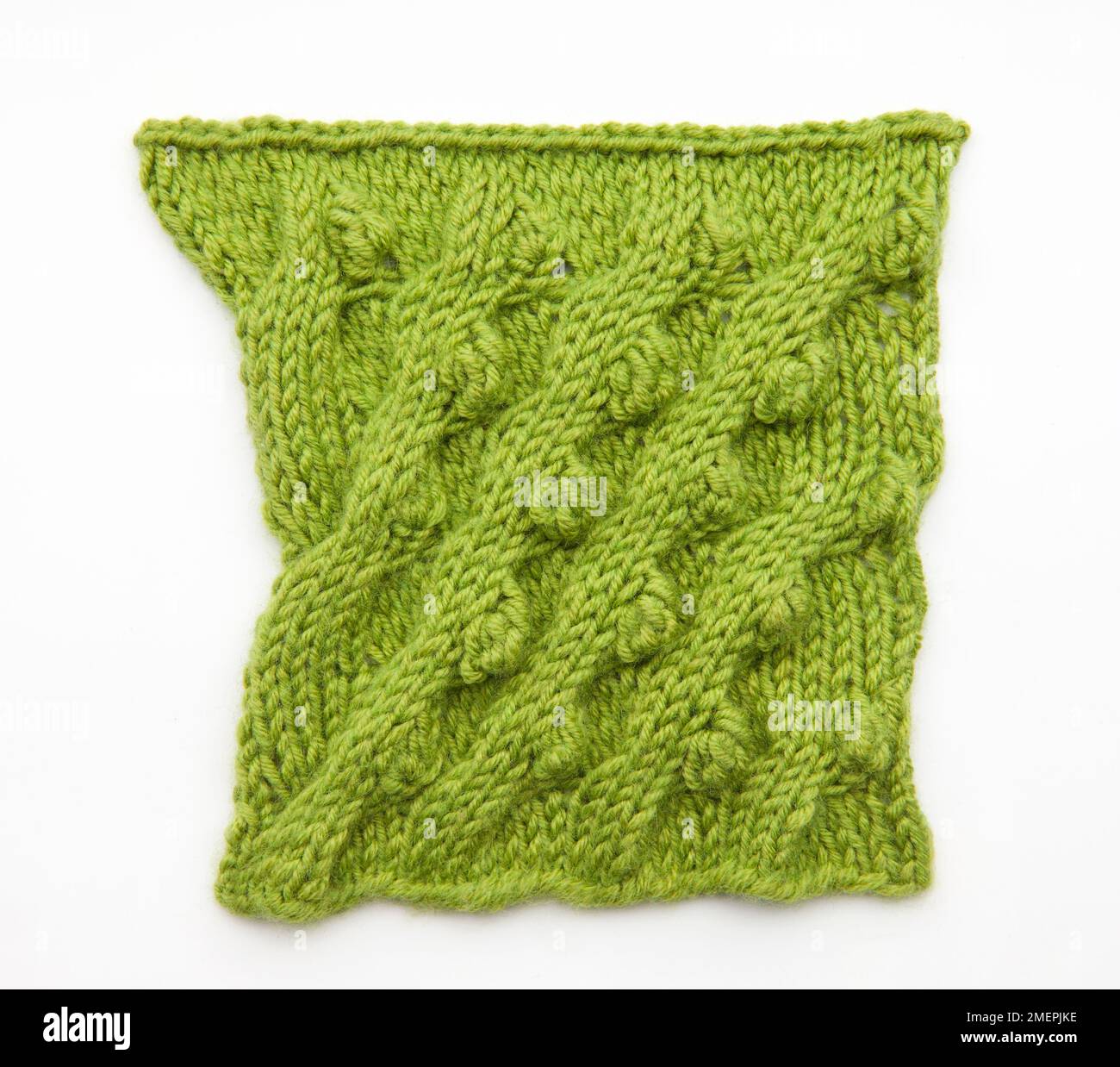 Bobble cable stitch knitting sample Stock Photo - Alamy