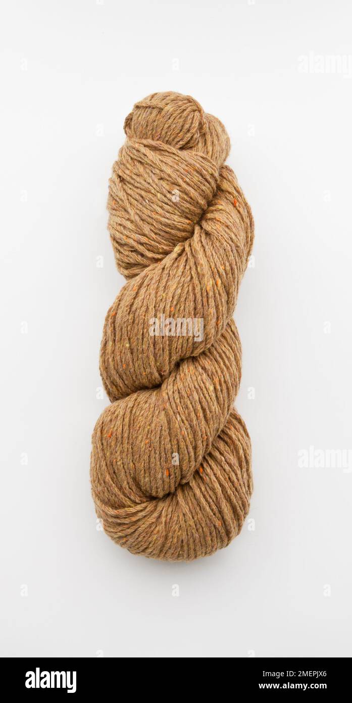 Twist of brown silky tweed yarn Stock Photo