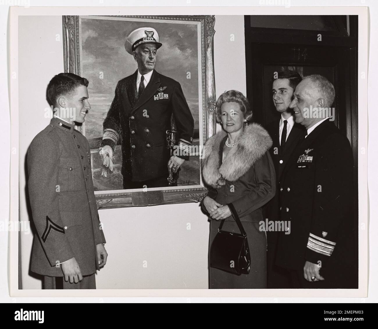 Painting of Rear Admiral Frank A. Leamy. Picture shows a group standing around an oil painting of Frank A. Leamy. Stock Photo
