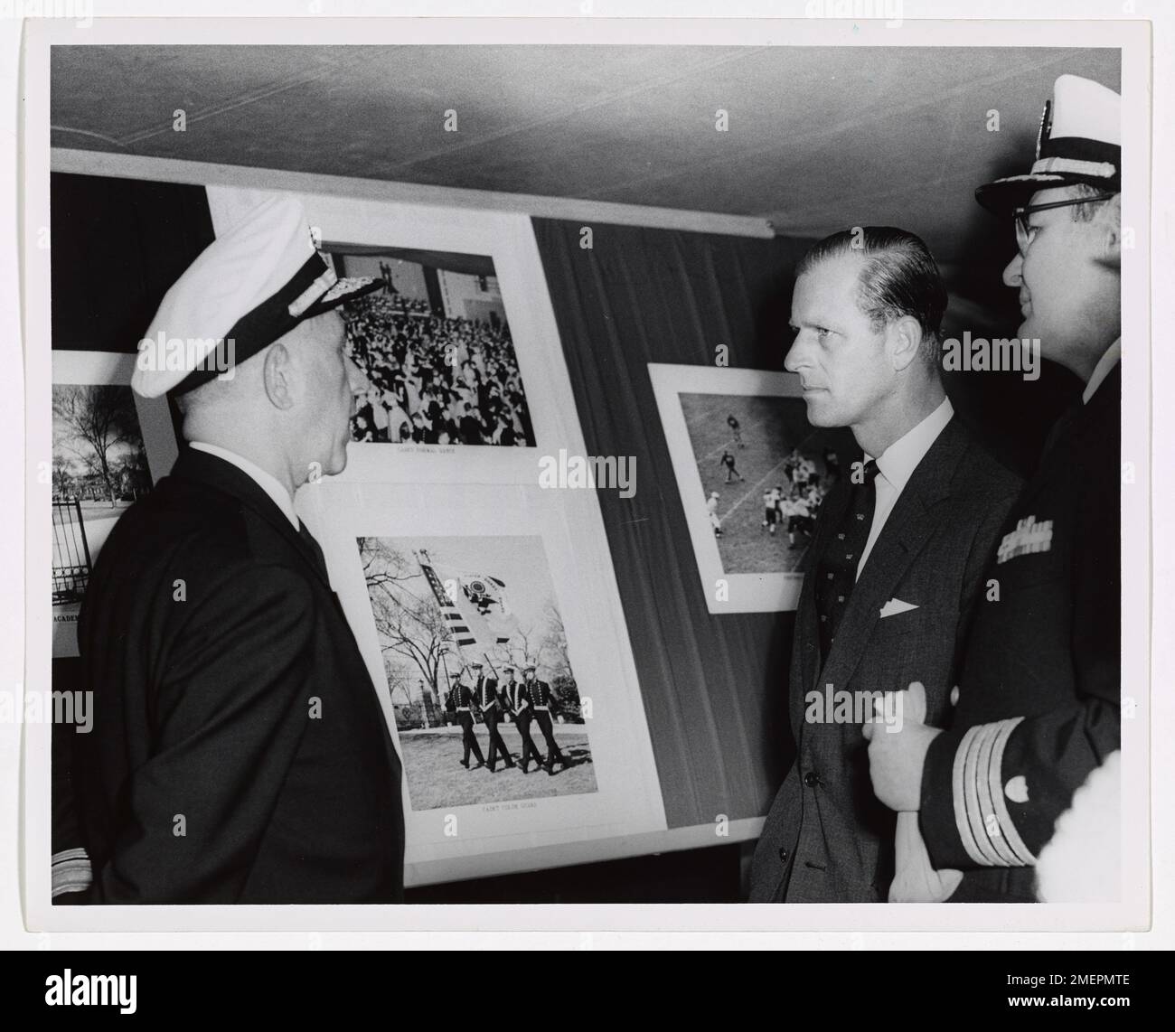 H.R.H. Prince Philip, the Duke of Edinburgh, viewing a mounted photograph display. Stock Photo