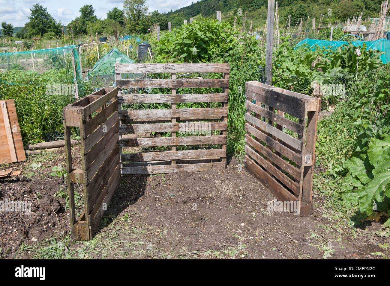 Constructing a compost heap Stock Photo Alamy