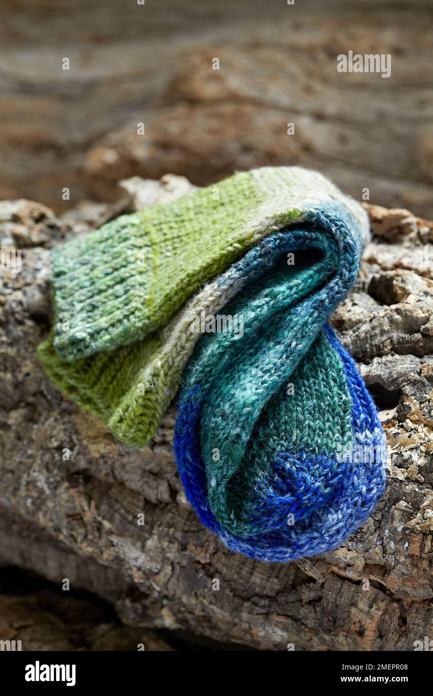 Pair of blue and green striped woolly socks Stock Photo