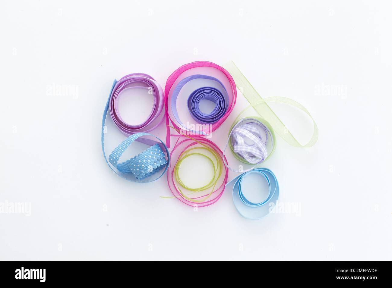 Ribbons in various widths and colours, overhead view Stock Photo Alamy