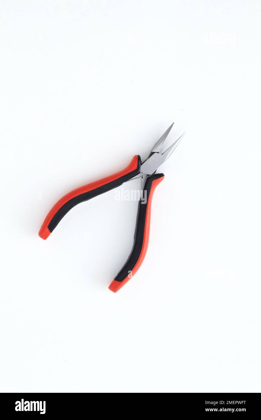Jewellery maker snipe-nose pliers, overhead view Stock Photo