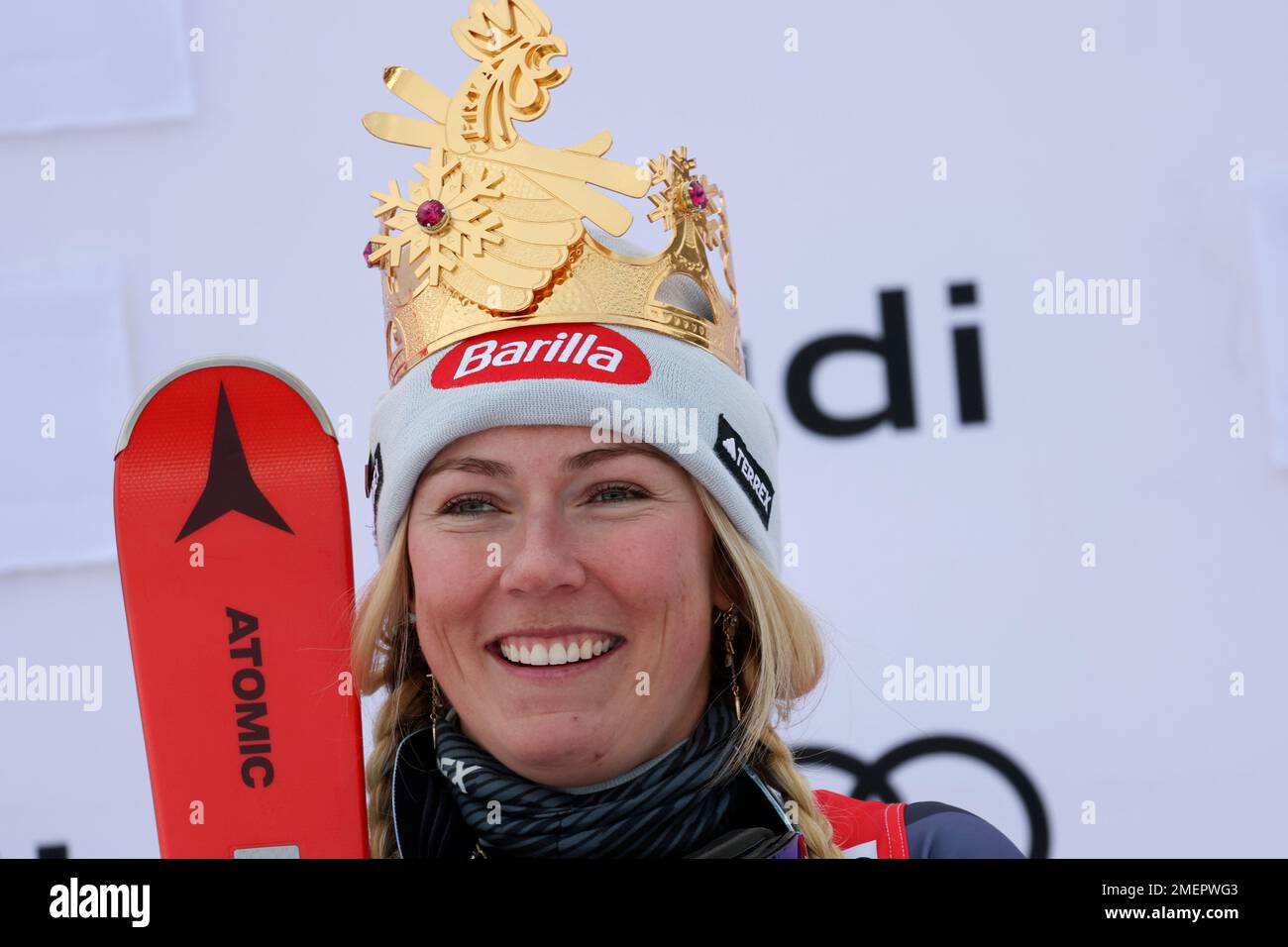 United States' Mikaela Shiffrin wears a crown on her head as she celebrates on the podium after