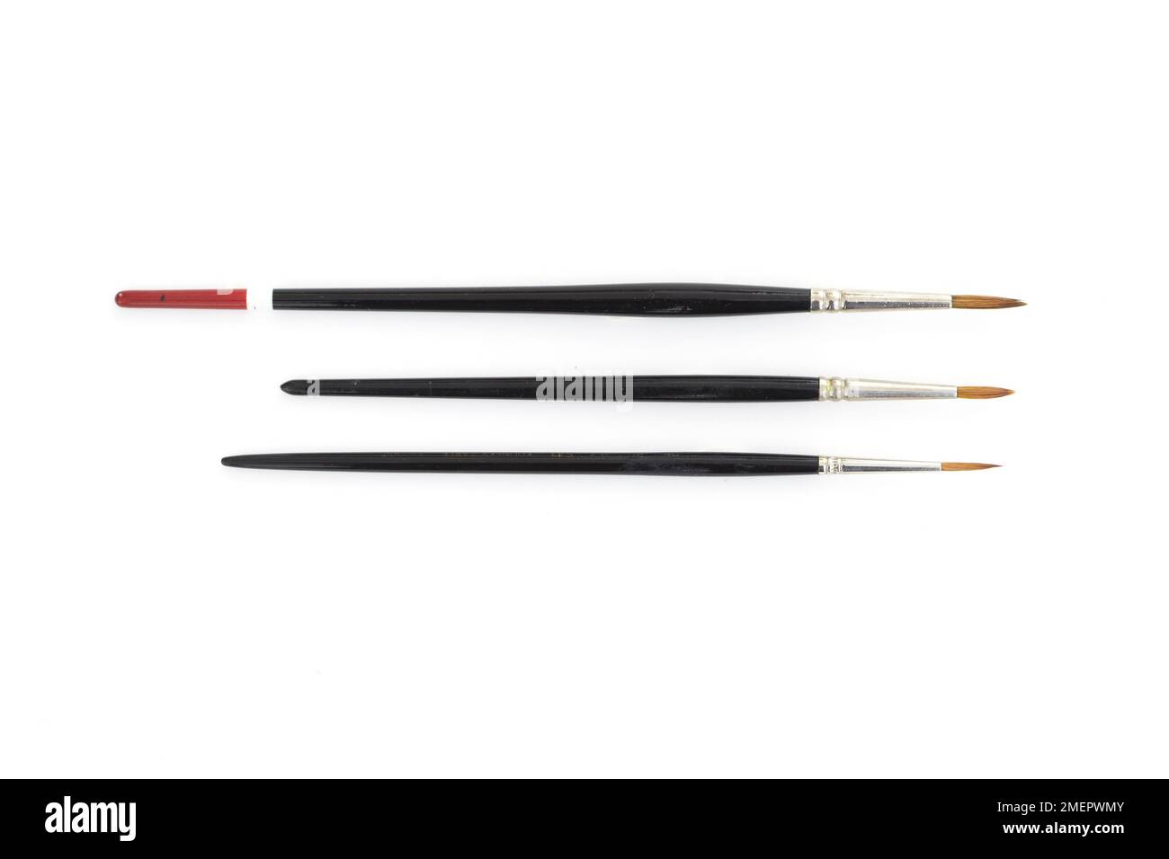 Three artist's sable brushes, close-up Stock Photo