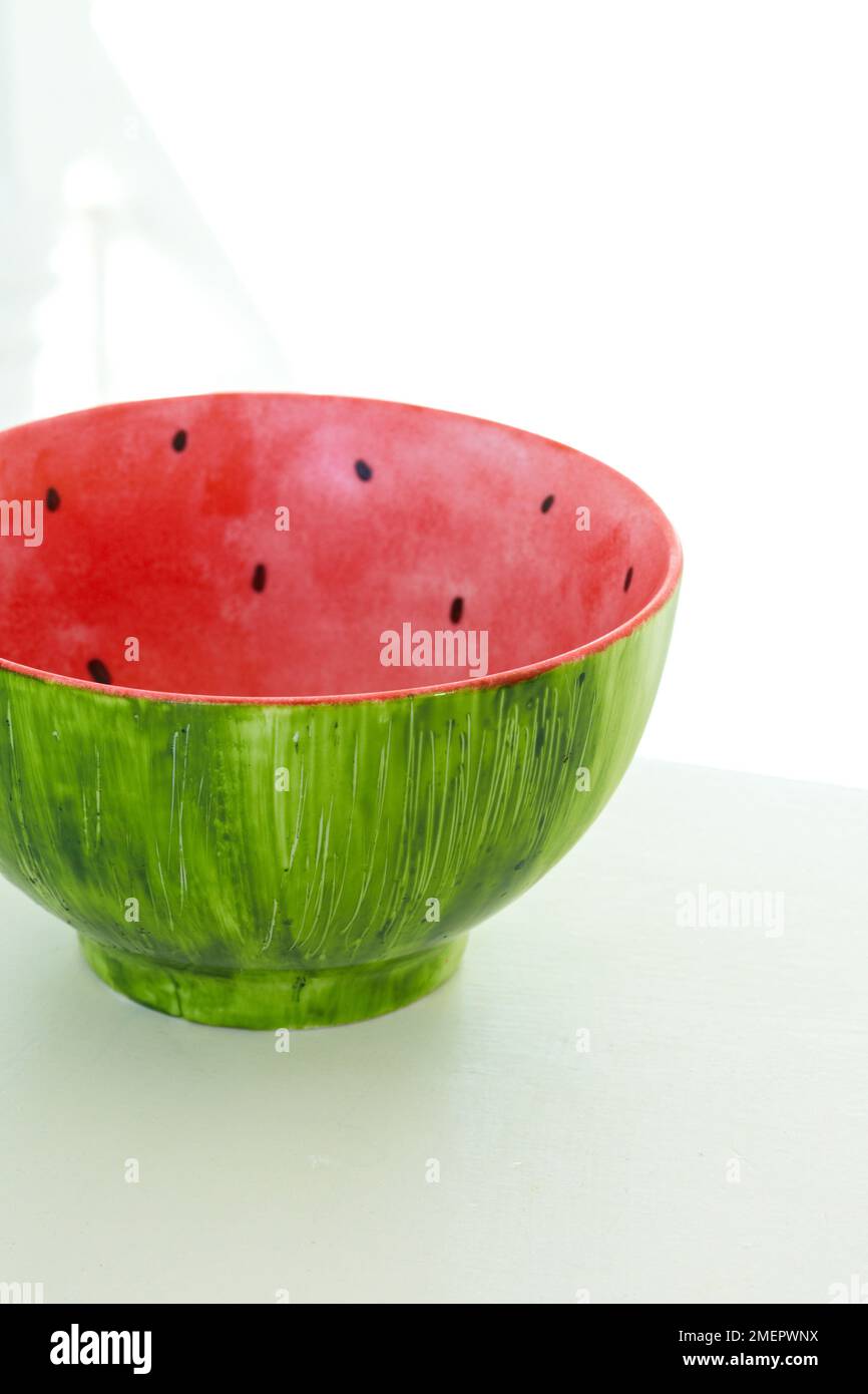 Simple ceramic watermelon-inspired fruit bowl, close-up Stock Photo - Alamy