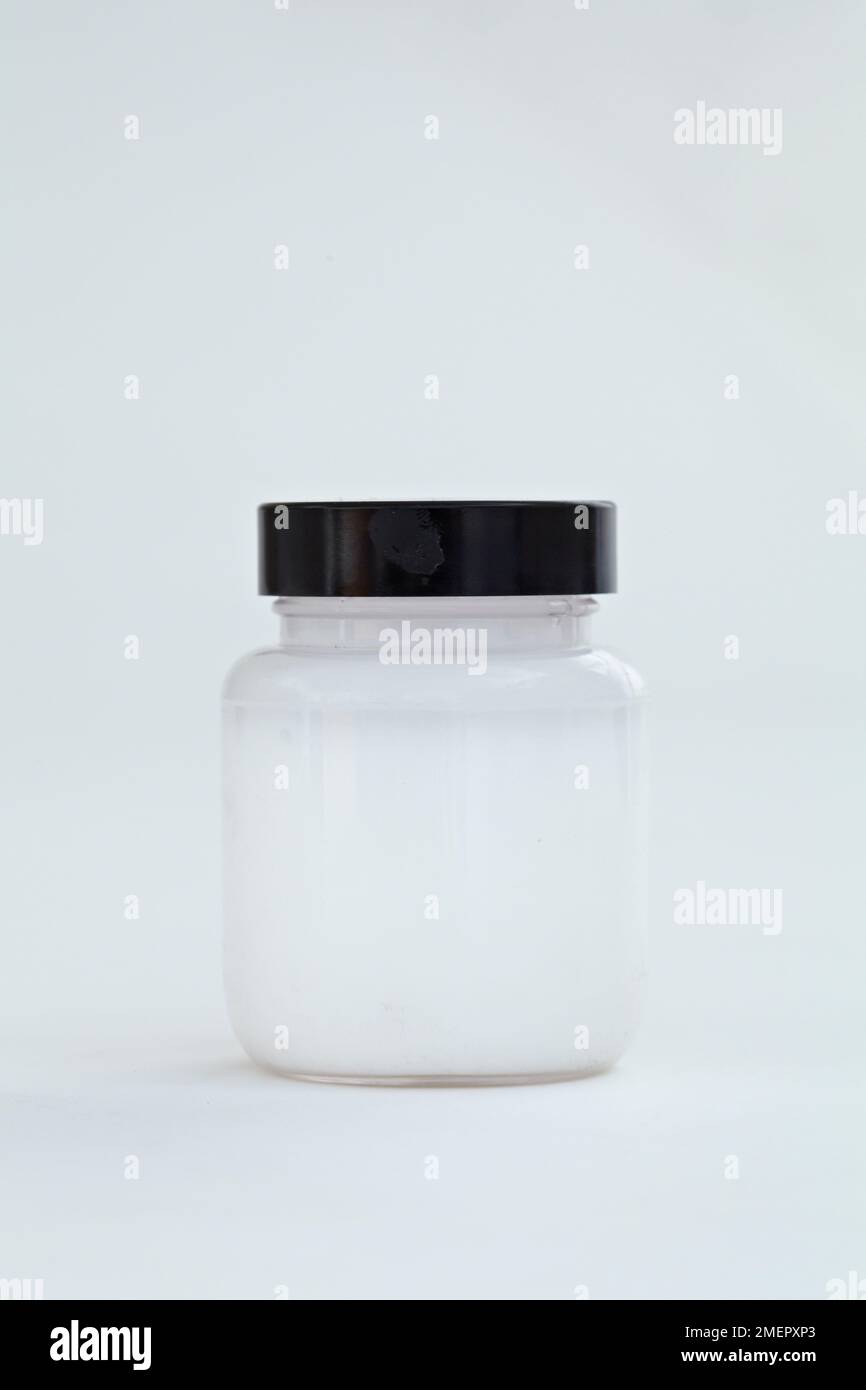 Small jar of PVA glue Stock Photo
