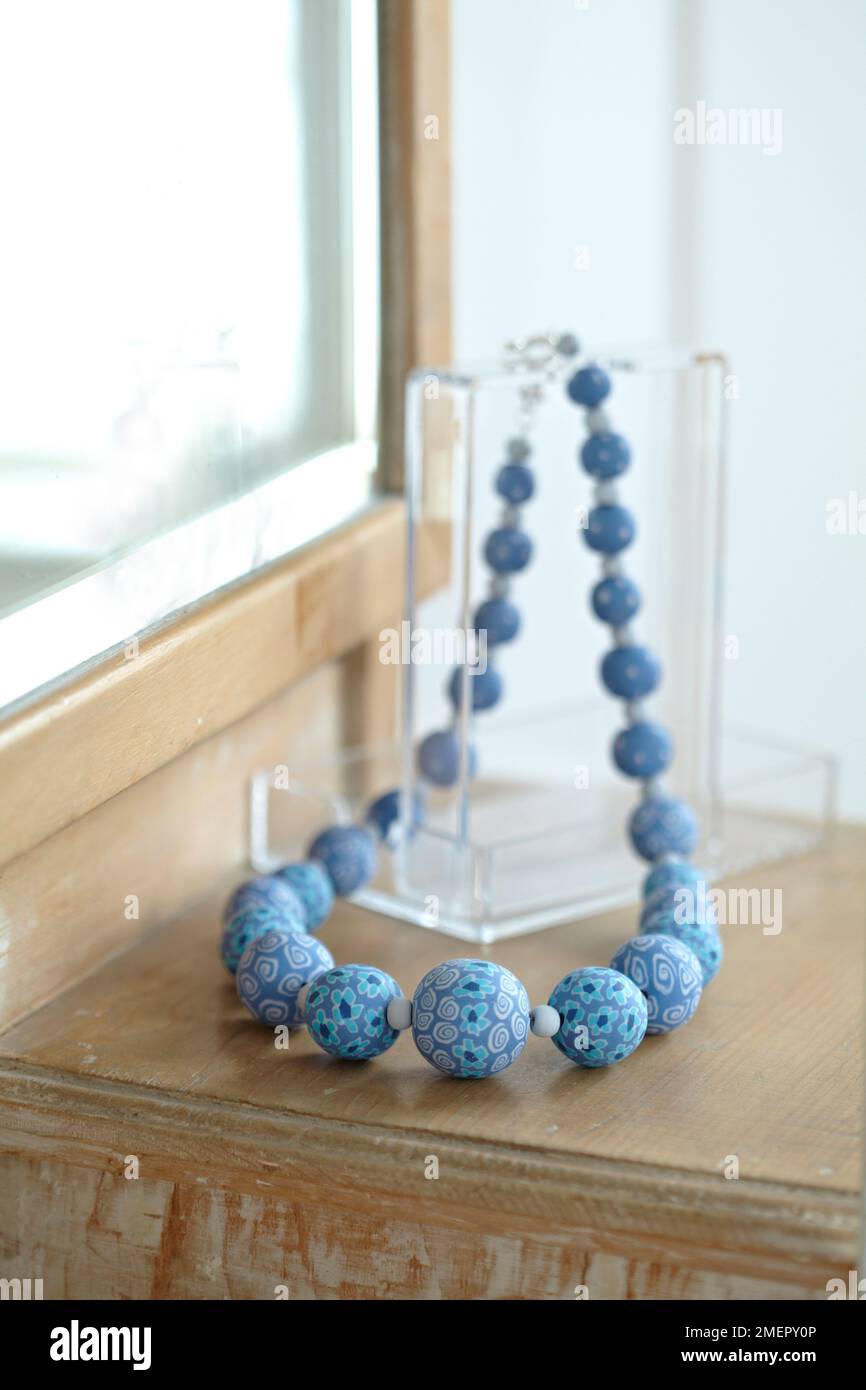 Blue water beads in a jar Stock Photo - Alamy