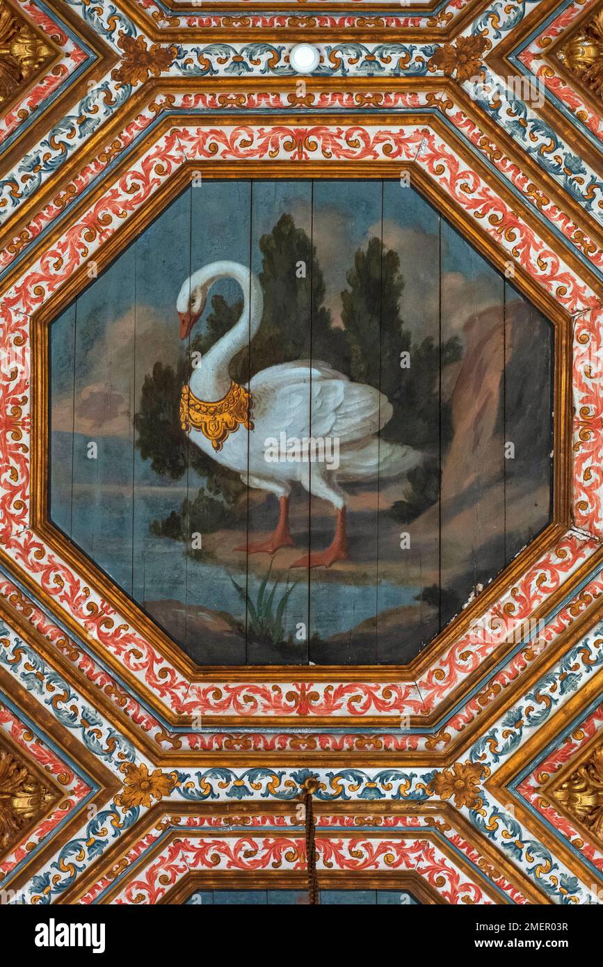 One of the 30 crowned swans painted in the 1400s on the ceiling of the Sala dos Cisnes or Room of the Swans in the Palácio Nacional, the royal summer palace at Sintra, near Lisbon, Portugal, recall England’s Lancastrian royal dynasty and the marriage in 1387 of Philippa of Lancaster to the Portuguese monarch, King John I. Stock Photo