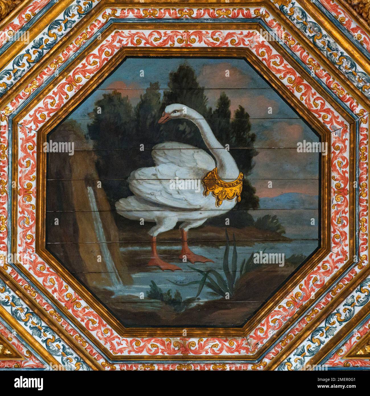 The Room of the Swans: square format view of one of the 30 swans wearing golden crowns around their necks painted in the 1400s on the ceiling of the Sala dos Cisnes in the Palácio Nacional, the royal summer palace at Sintra, near Lisbon, Portugal.  The crowned birds recall England’s Lancastrian royal dynasty and the marriage in 1387 of Philippa of Lancaster to the Portuguese monarch, King John I. Stock Photo