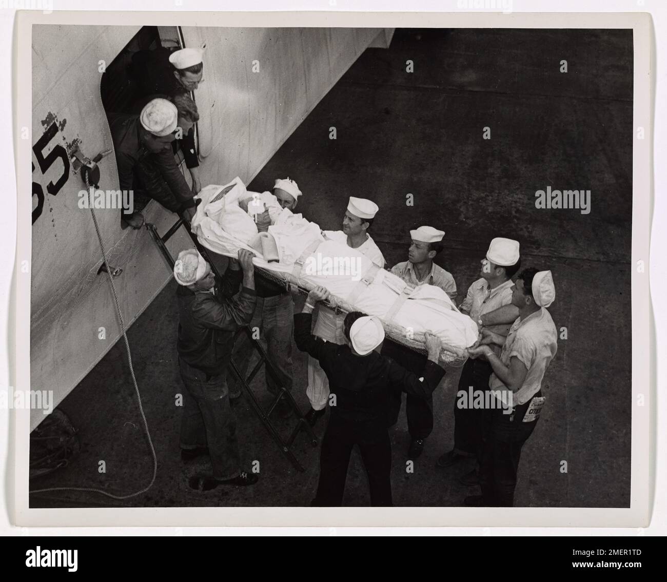 Rescue of Merchant Sailor. This image depicts a description of the rescue by Coast Guard helicopter of Otto Rytke, a sailor in the Merchant Marine, following his injury aboard his vessel. Stock Photo