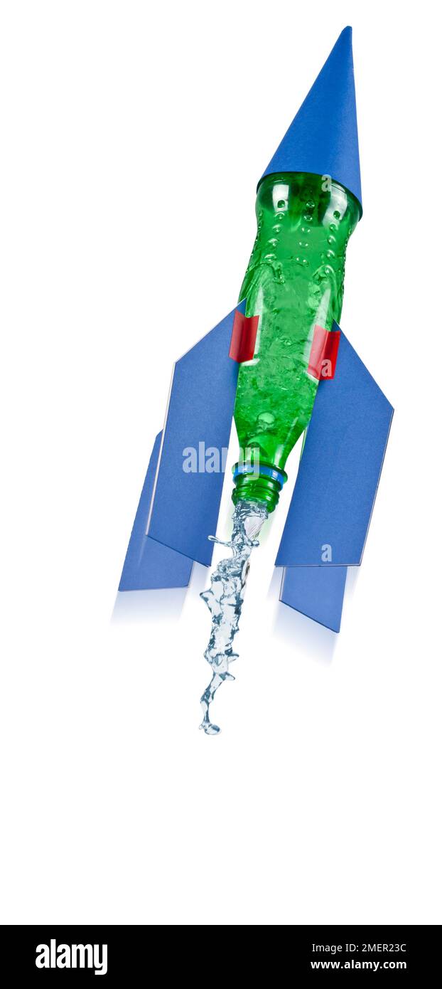 Toy rocket made from a green plastic bottle Stock Photo