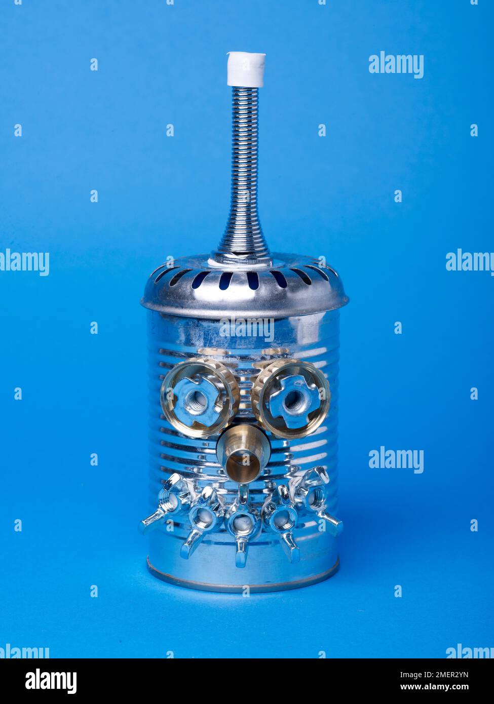 Robot made from tin can and sink plug hole strainer Stock Photo